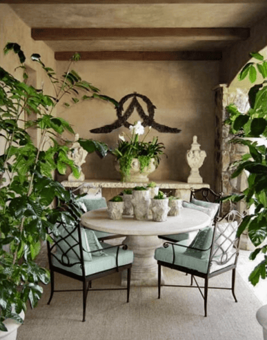 Design by Barbara Grigsby featuring a Stone Yard custom table and console